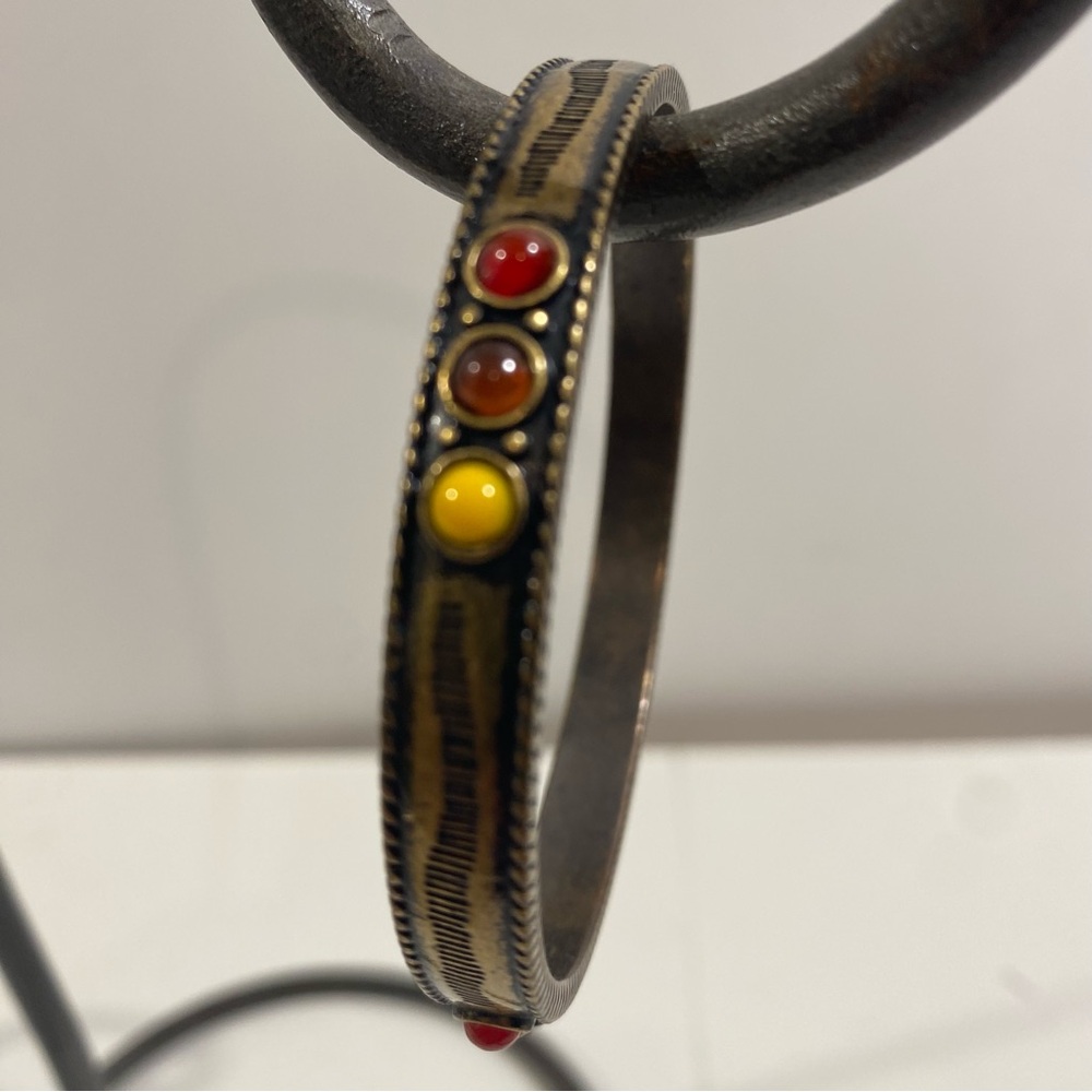 Lucky You Bangle Bracelet Cooper Tone with Etching Faux Red Yellow Stones